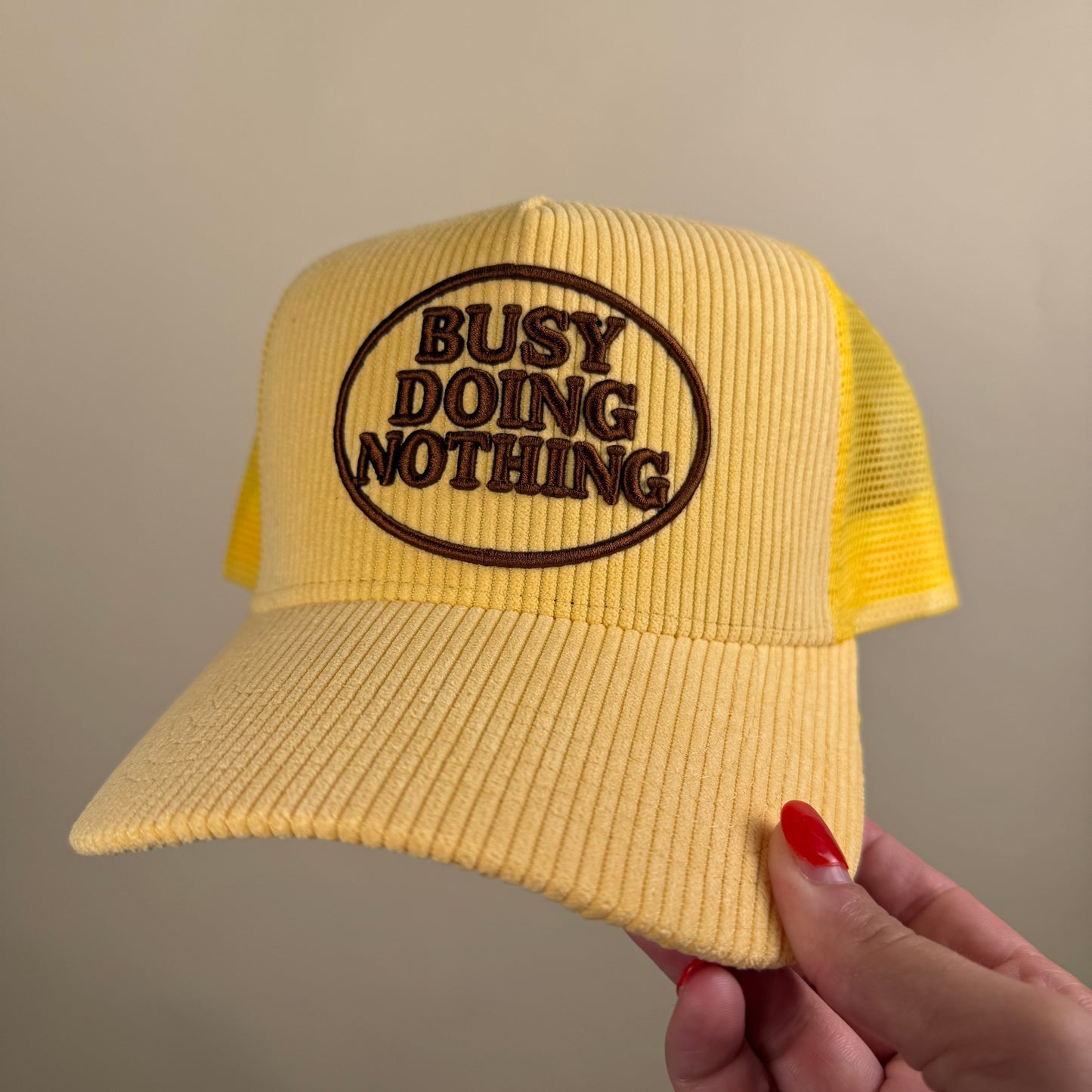 Busy Doing Nothing Trucker Hat