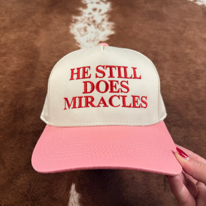 He Still Does Miracles Trucker Hat