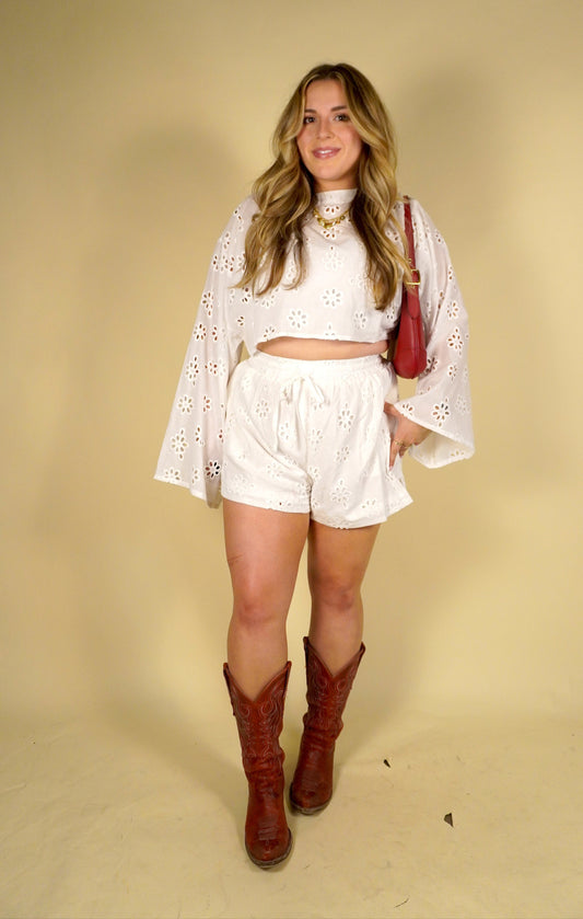 Women's white eyelet cropped set with matching shorts. Summer women's style and fashion.
