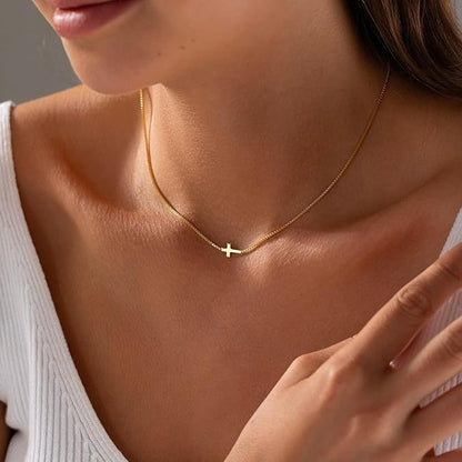 Gold necklace with a cross pendant