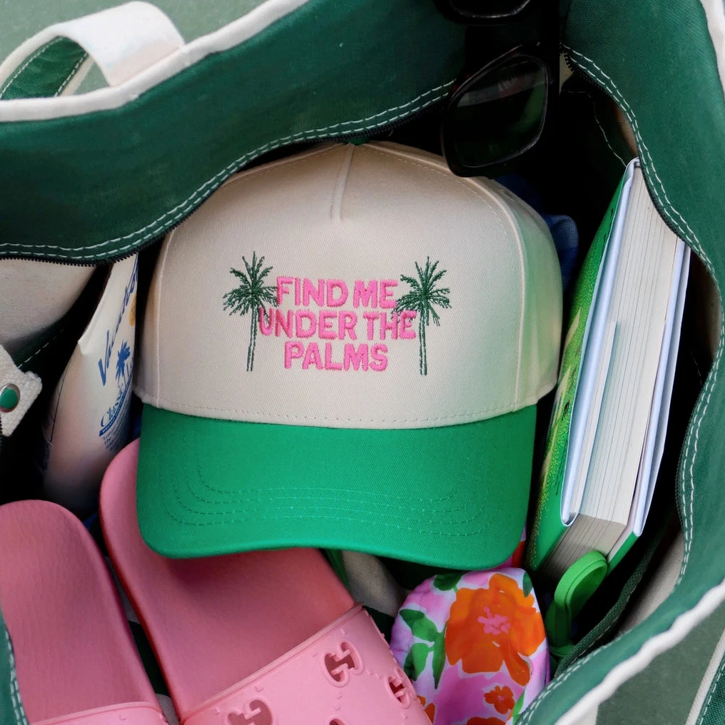 Women's Summer trucker hat with 'Find me under the palms' text. Summer vacation hats.