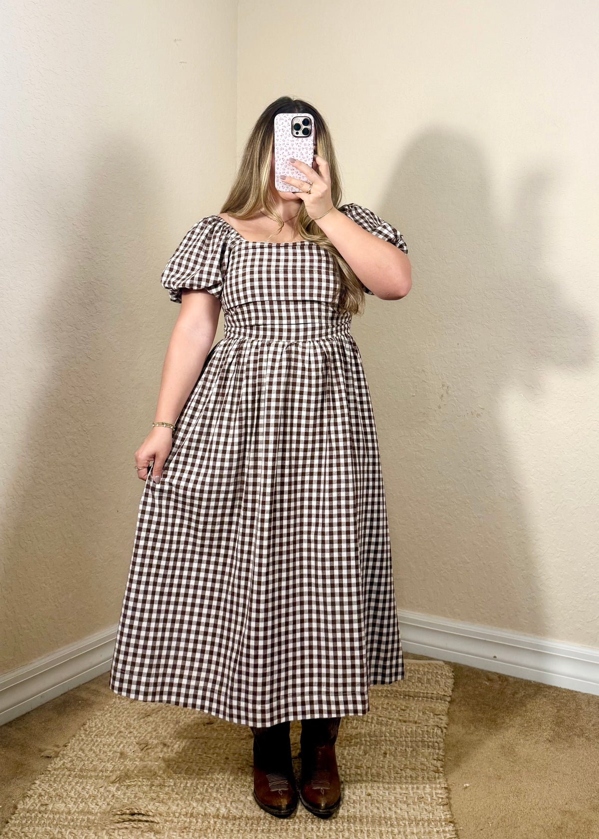 Feminine brown and cream plaid midi dress perfect for Thanksgiving dinner, pumpkin patches, and autumn outings.
