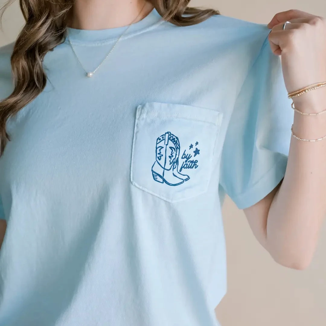 christian women's graphic tee with walk by faith and cowgirl boot on it.