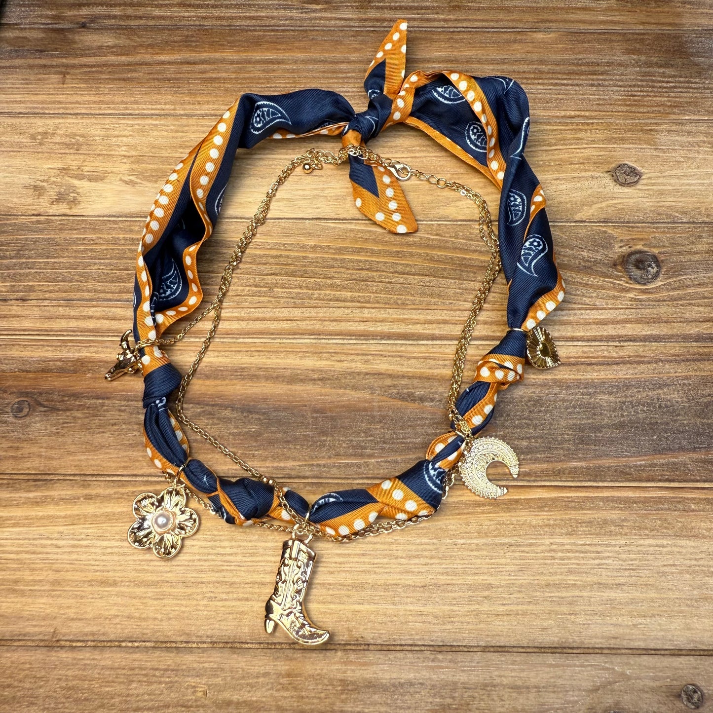 Trendy Western Scarf necklace with gold charms. Perfect addition to a classy chic western look.