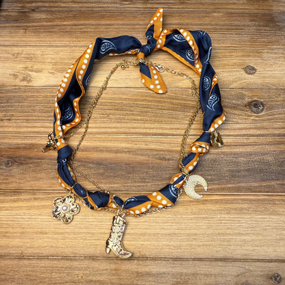 Trendy Western Scarf necklace with gold charms. Perfect addition to a classy chic western look.