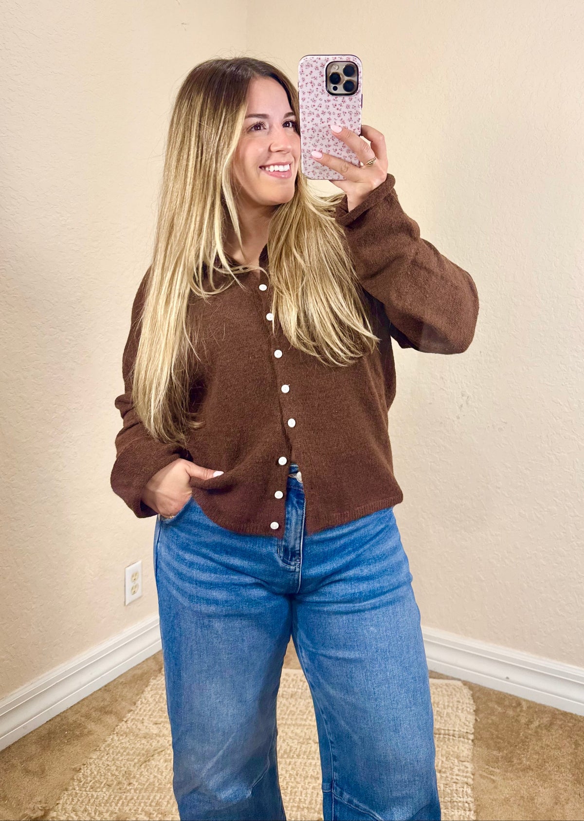 Chocolate brown cardigan styled with jeans and boots for fall